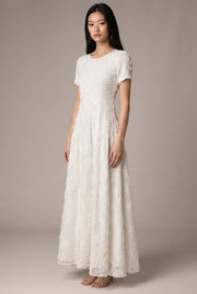 Creamy White Embroidery A- Line Dress — White — AI-generated studio three-quarter view