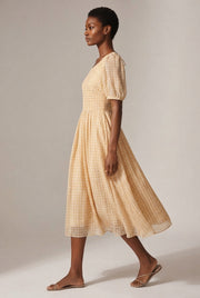 French Retro Plaid Skirt New Women's Western Style Chiffon Dress — Yellow — AI-generated studio left-side walking view