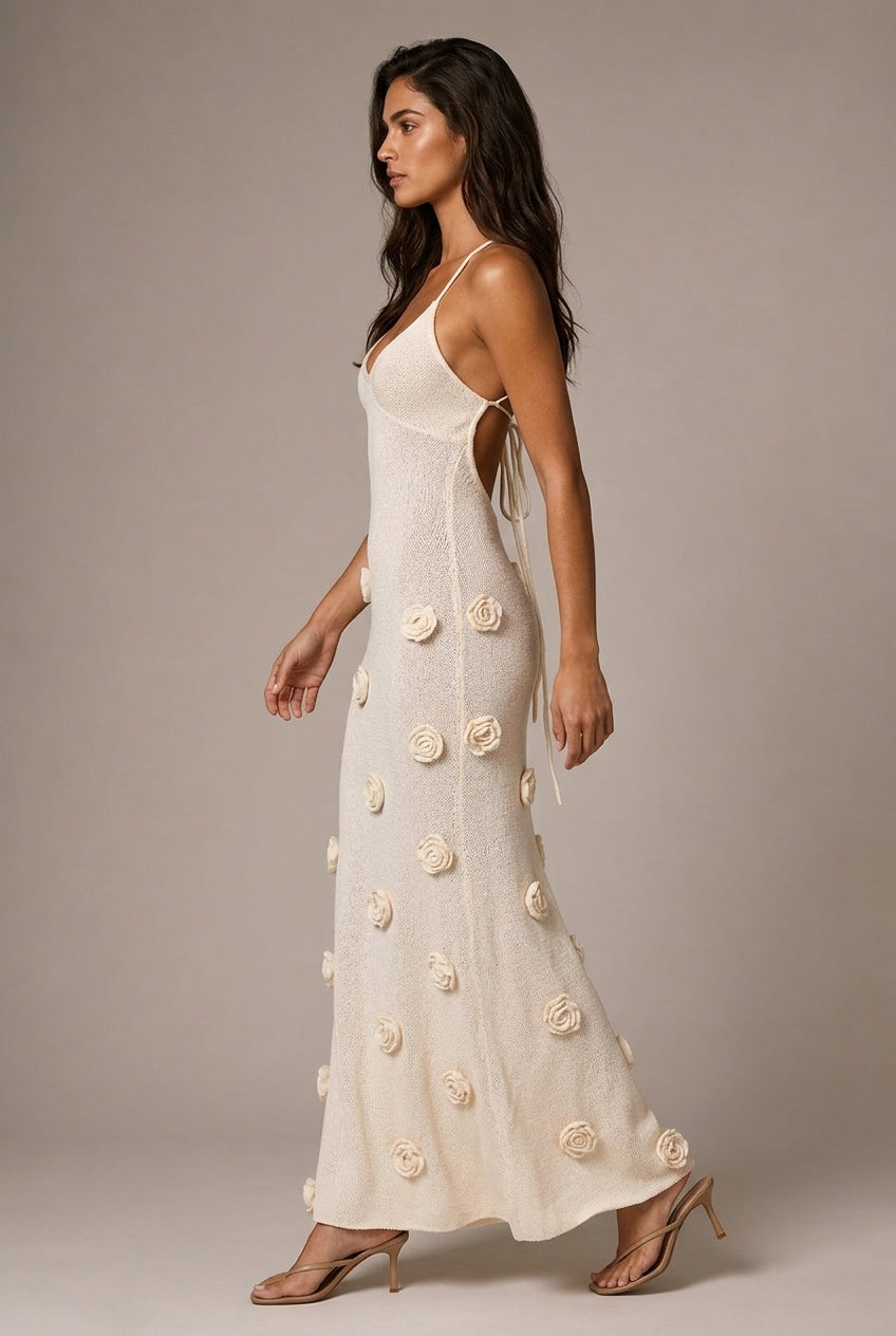New Suspender Sleeveless Dress Three-dimensional Flower Heavy Industry Knitted Backless Tie — AI-generated studio left-side walking view