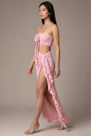 Sienna Rosette Maxi Dress — Pink — AI-generated studio left-side walking view