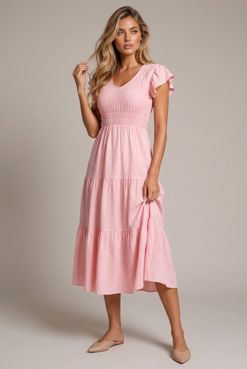 Pink Midi Dress With Ruffled Sleeves And A Tiered Hem — AI-generated studio three-quarter view