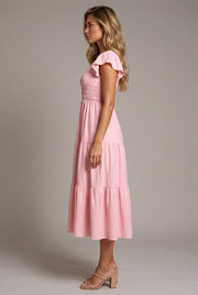 Pink Midi Dress With Ruffled Sleeves And A Tiered Hem — AI-generated studio right-side profile