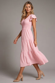 Pink Midi Dress With Ruffled Sleeves And A Tiered Hem — AI-generated studio left-side walking view