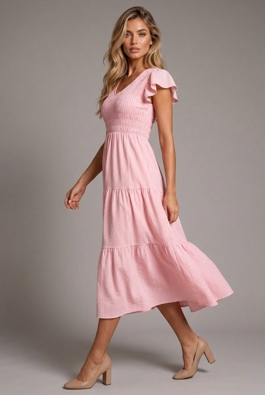 Pink Midi Dress With Ruffled Sleeves And A Tiered Hem — AI-generated studio left-side walking view