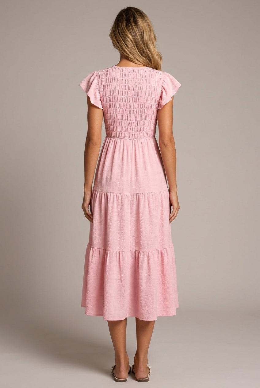 Pink Midi Dress With Ruffled Sleeves And A Tiered Hem — AI-generated studio back view