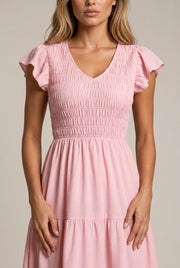 Pink Midi Dress With Ruffled Sleeves And A Tiered Hem — AI-generated studio bodice detail