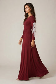 Round Neck Long Sleeve Lace Waist Maxi Dress — Wine red — AI-generated studio left-side walking view