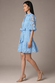 Romy Lace Mini Dress — Light Blue — AI-generated studio left-side walking view
