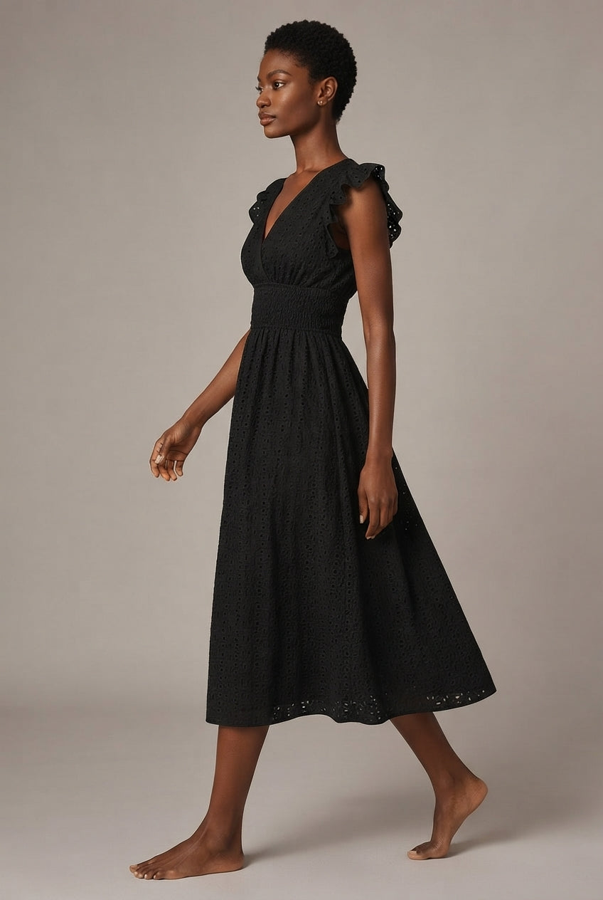 V-Neck Eyelet Embroidery Ruffle Sleeve Smocked Waist Midi Dress, Casual A-Line Summer Dress For Vacation — Black — AI-generated studio left-side walking view