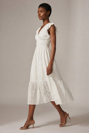 V-Neck Eyelet Embroidery Ruffle Sleeve Smocked Waist Midi Dress, Casual A-Line Summer Dress For Vacation — White — AI-generated studio left-side walking view